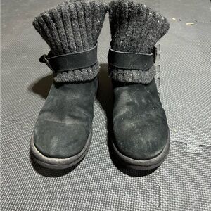 Black UGGs with buckle. Very worn. Side 9.